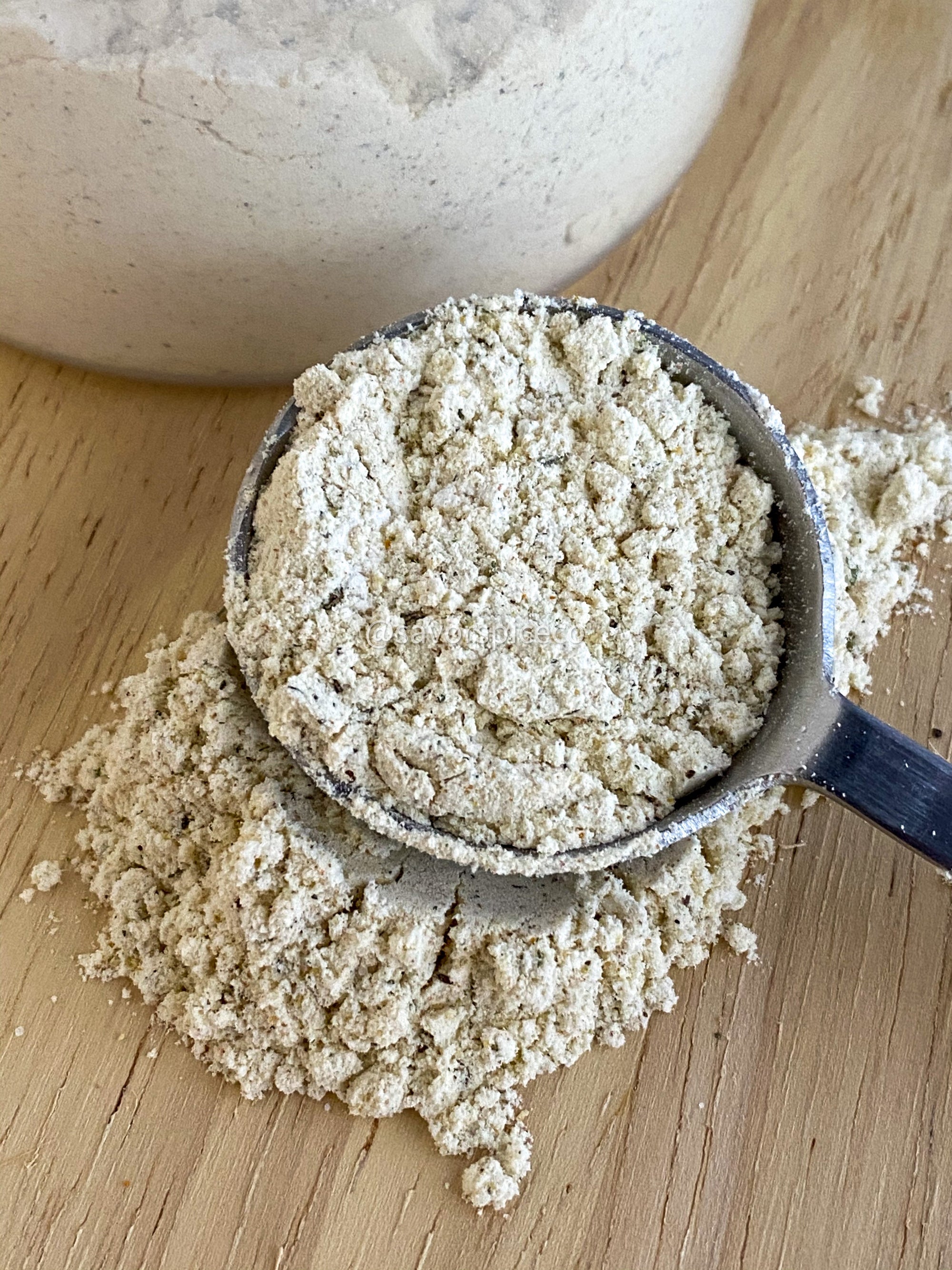 Scoop of yardbird seasoned flour